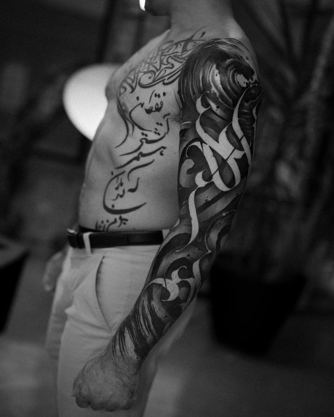 Tattoo by @low.original — lettering_script, blackwork