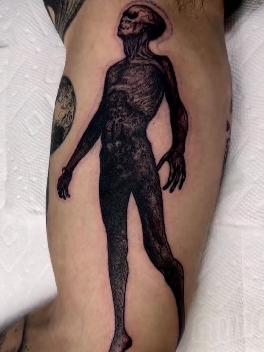 Tattoo by @austincpratttattoo — dark_realism, black_and_grey