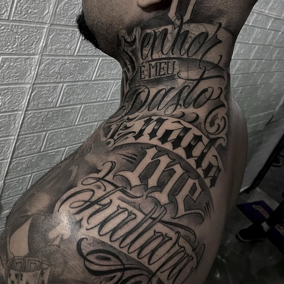 Tattoo by @xander.tatts β lettering_script, blackwork