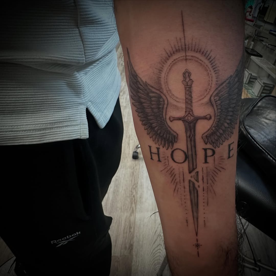 Tattoo by @javier_jimenez_tattoo_ — black_and_grey, lettering_script