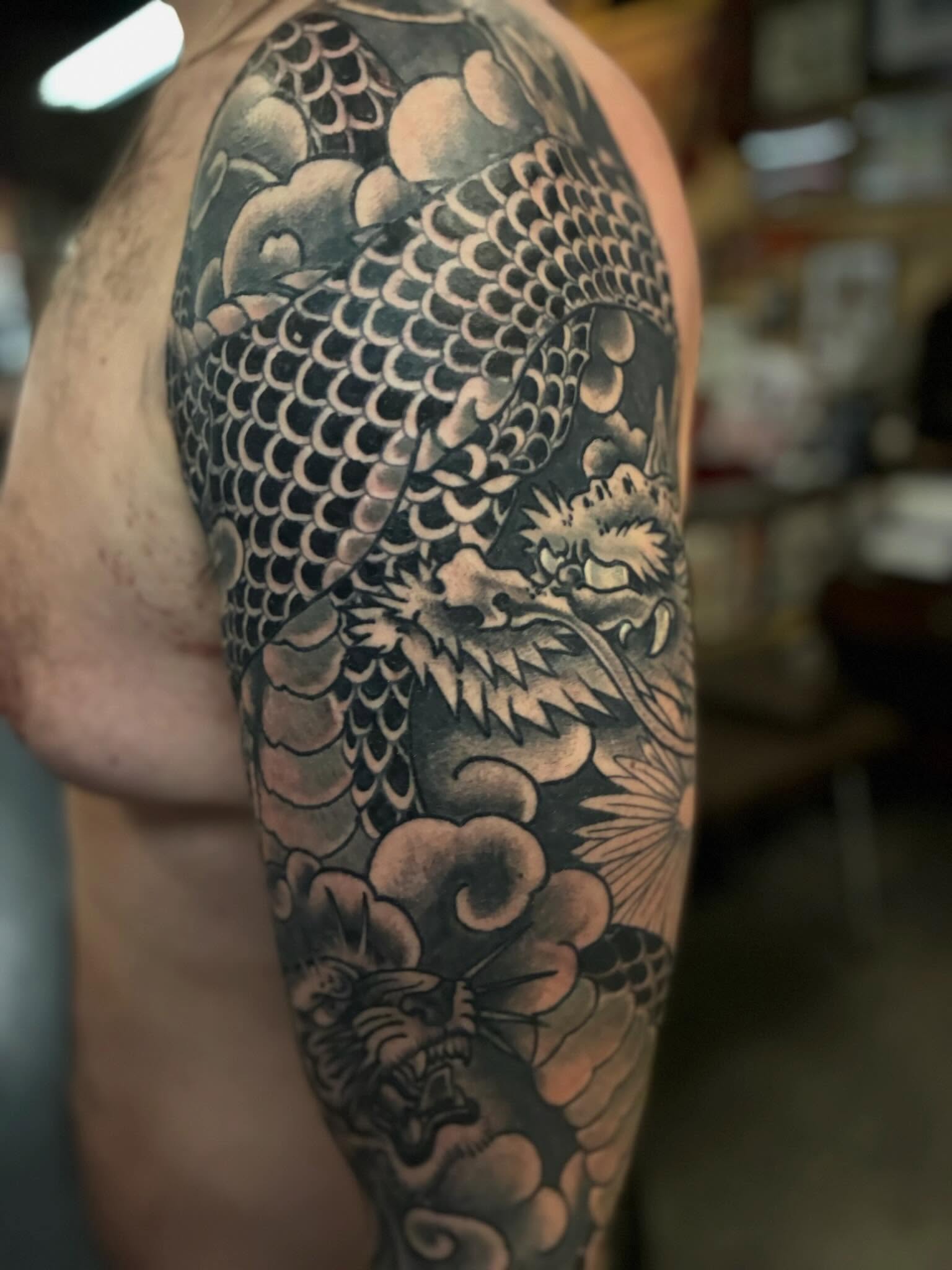 Tattoo by @joeyknucklestattoo — japanese_irezumi, black_and_grey