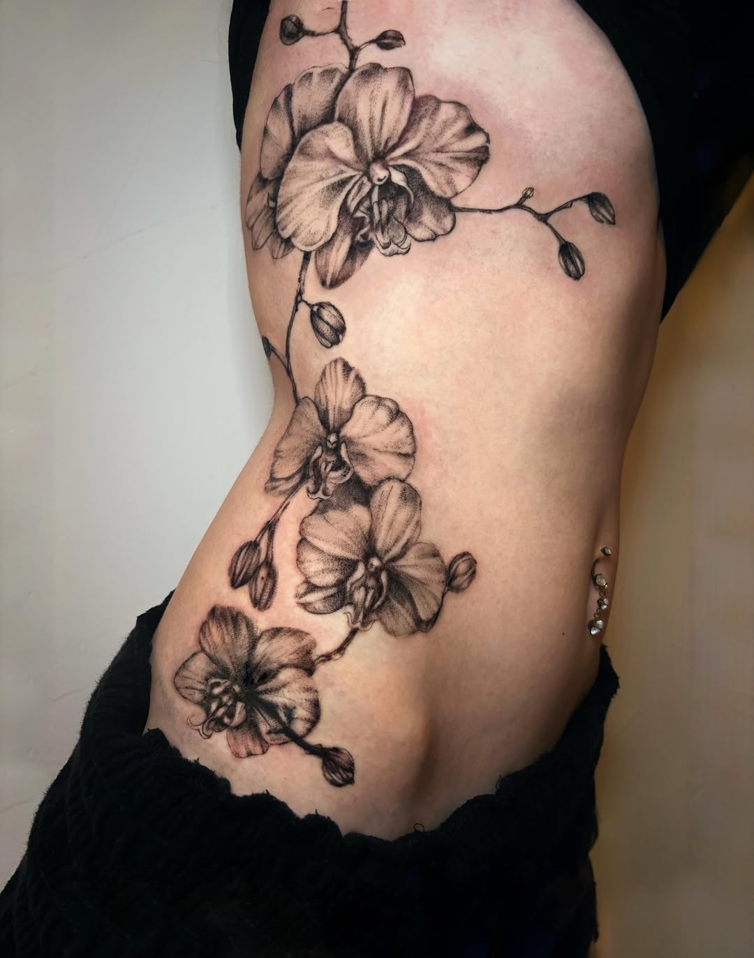 Tattoo by @liz.tattooz — realism, black_and_grey