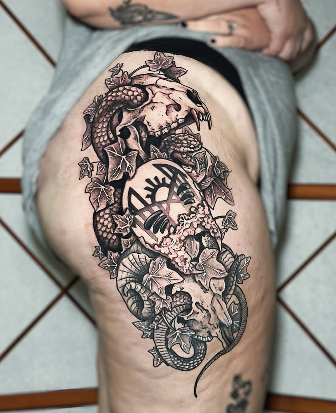 Tattoo by @spookycreature.art โ dark_realism, black_and_grey