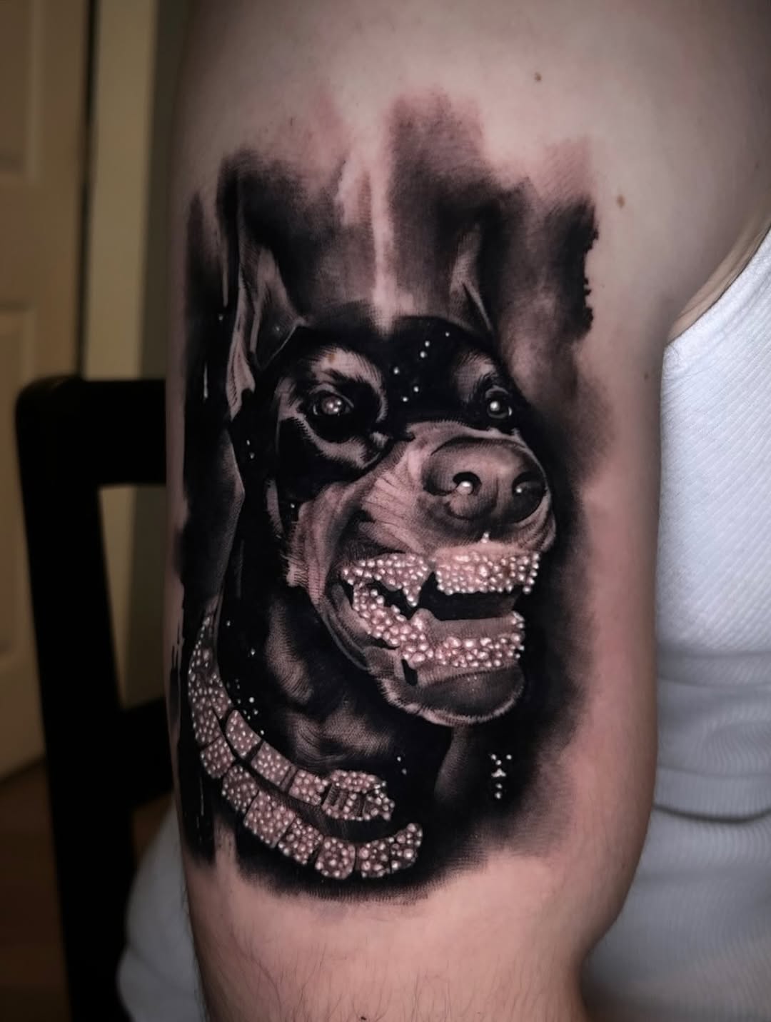 Tattoo by @cxrsmeiertattoos — realism, black_and_grey
