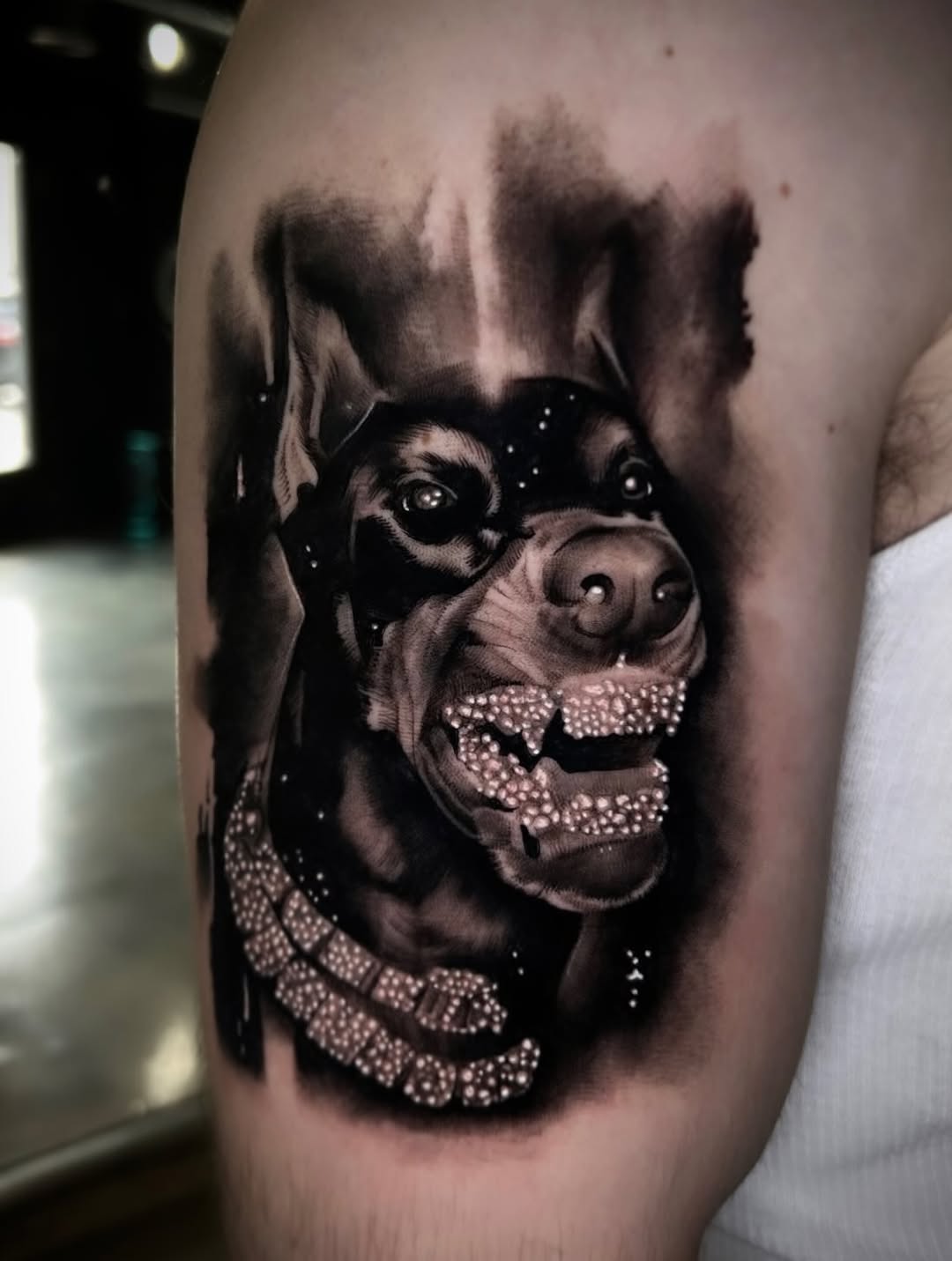 Tattoo by @cxrsmeiertattoos — realism, black_and_grey