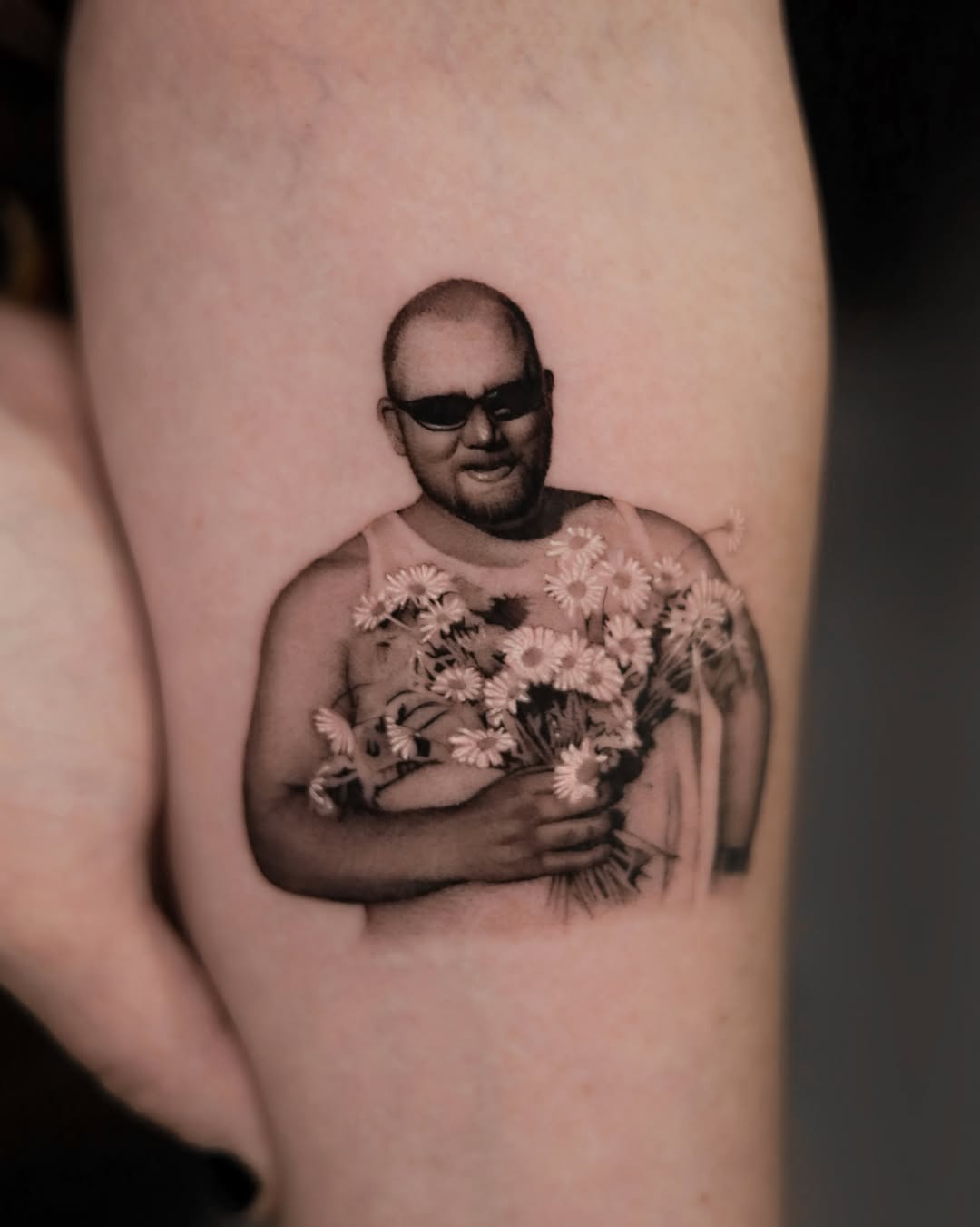 Tattoo by @dionne.tattoo โ realism, black_and_grey