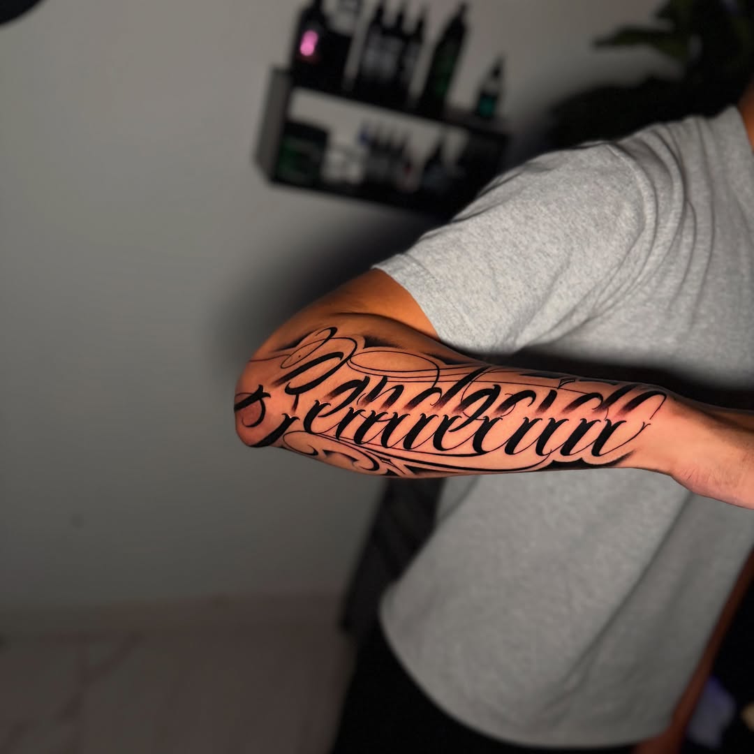 Tattoo by @inkbycasillas — lettering_script, blackwork