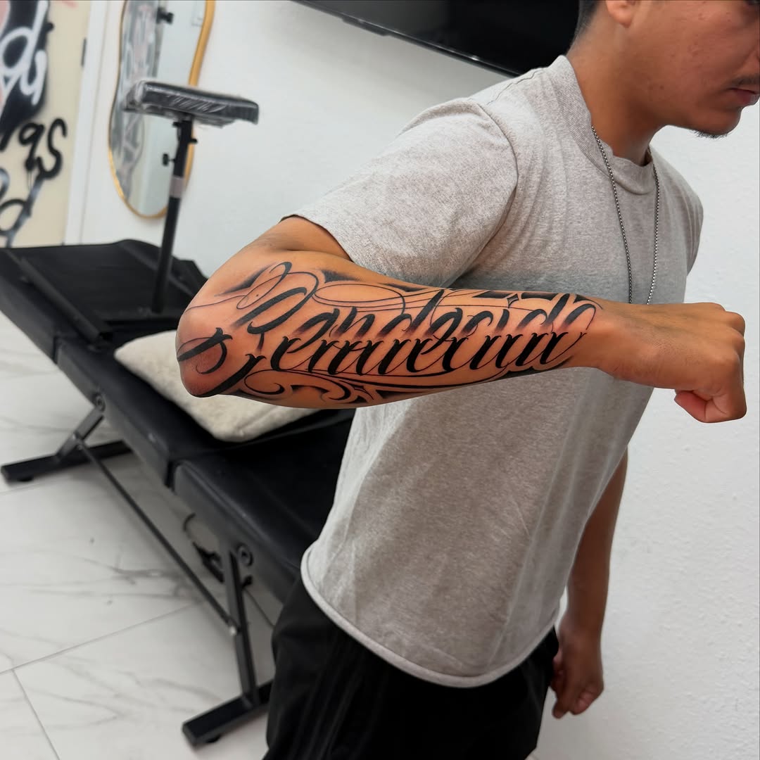 Tattoo by @inkbycasillas — lettering_script, blackwork