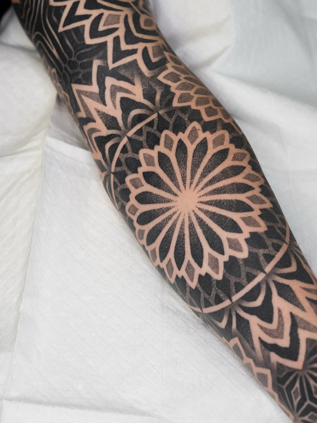 Tattoo by @rjxdots — geometric, dotwork