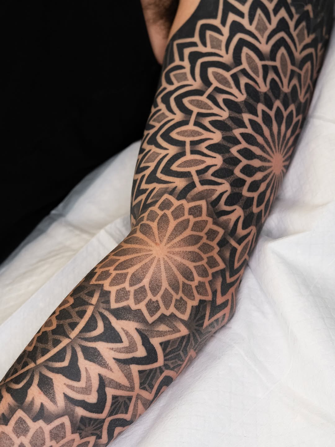 Tattoo by @rjxdots — geometric, dotwork