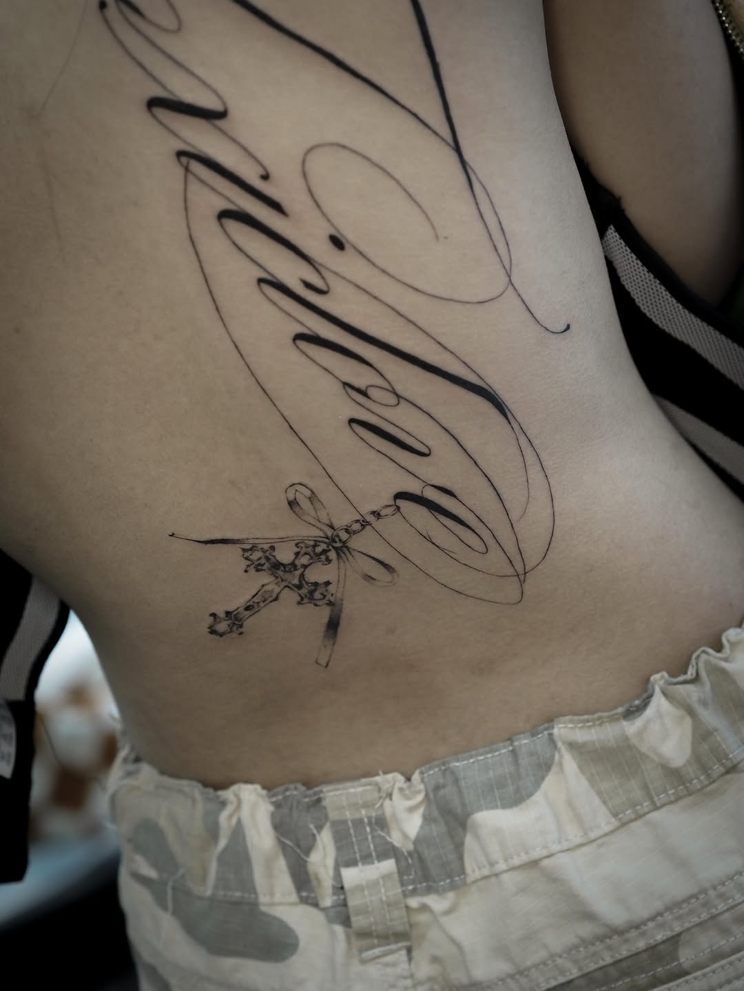 Tattoo by @arinyatatt.2 — lettering_script, fine_line