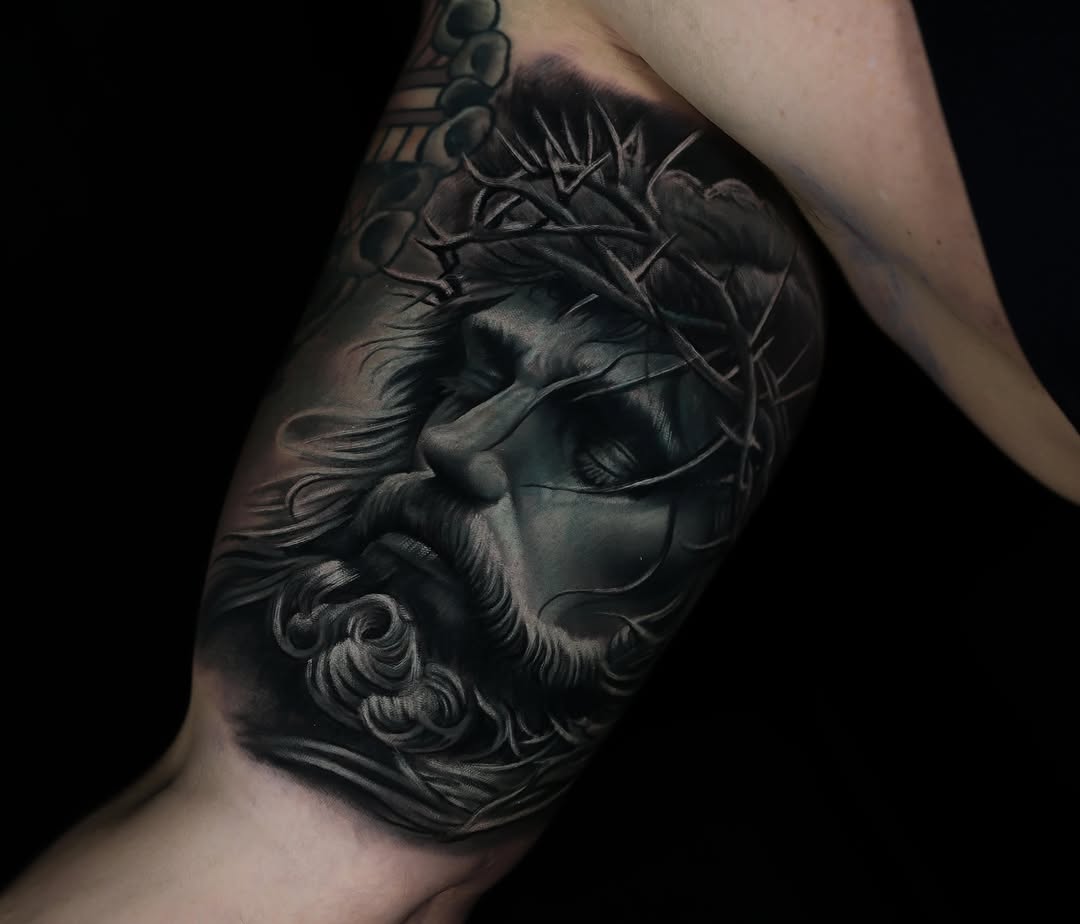Tattoo by @serdarbolukbasi.ink — realism, black_and_grey