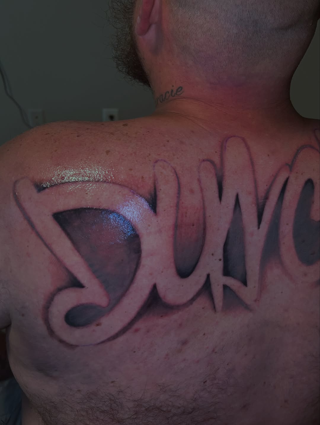 Tattoo by @grs_pacino — lettering_script, black_and_grey