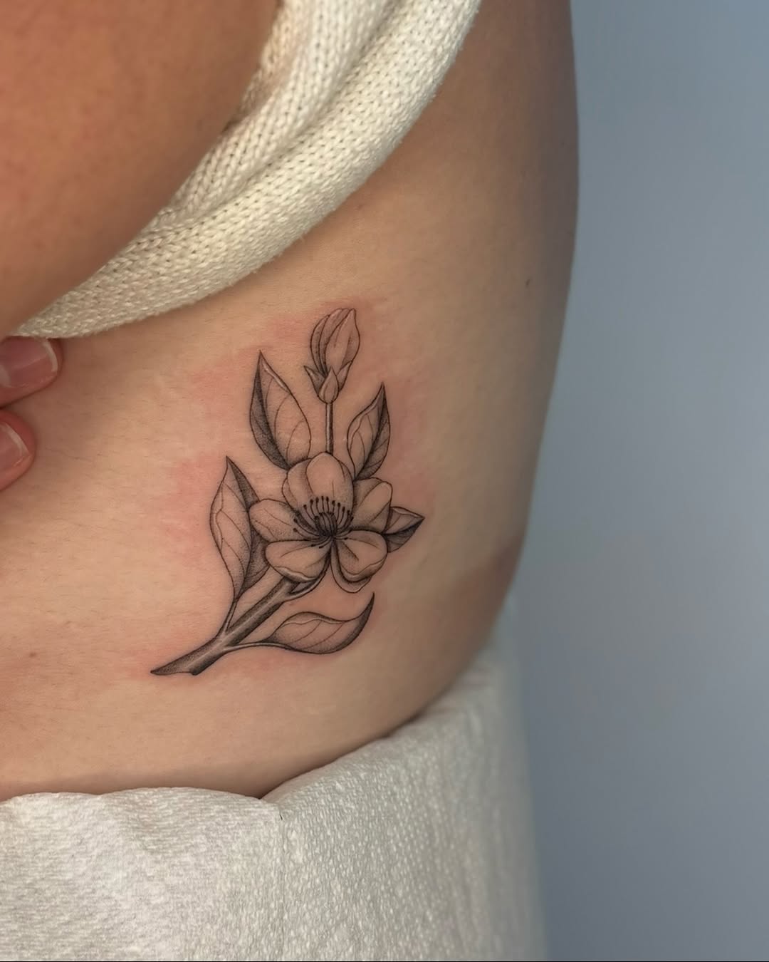 Tattoo by @jadegir.art — fine_line, black_and_grey