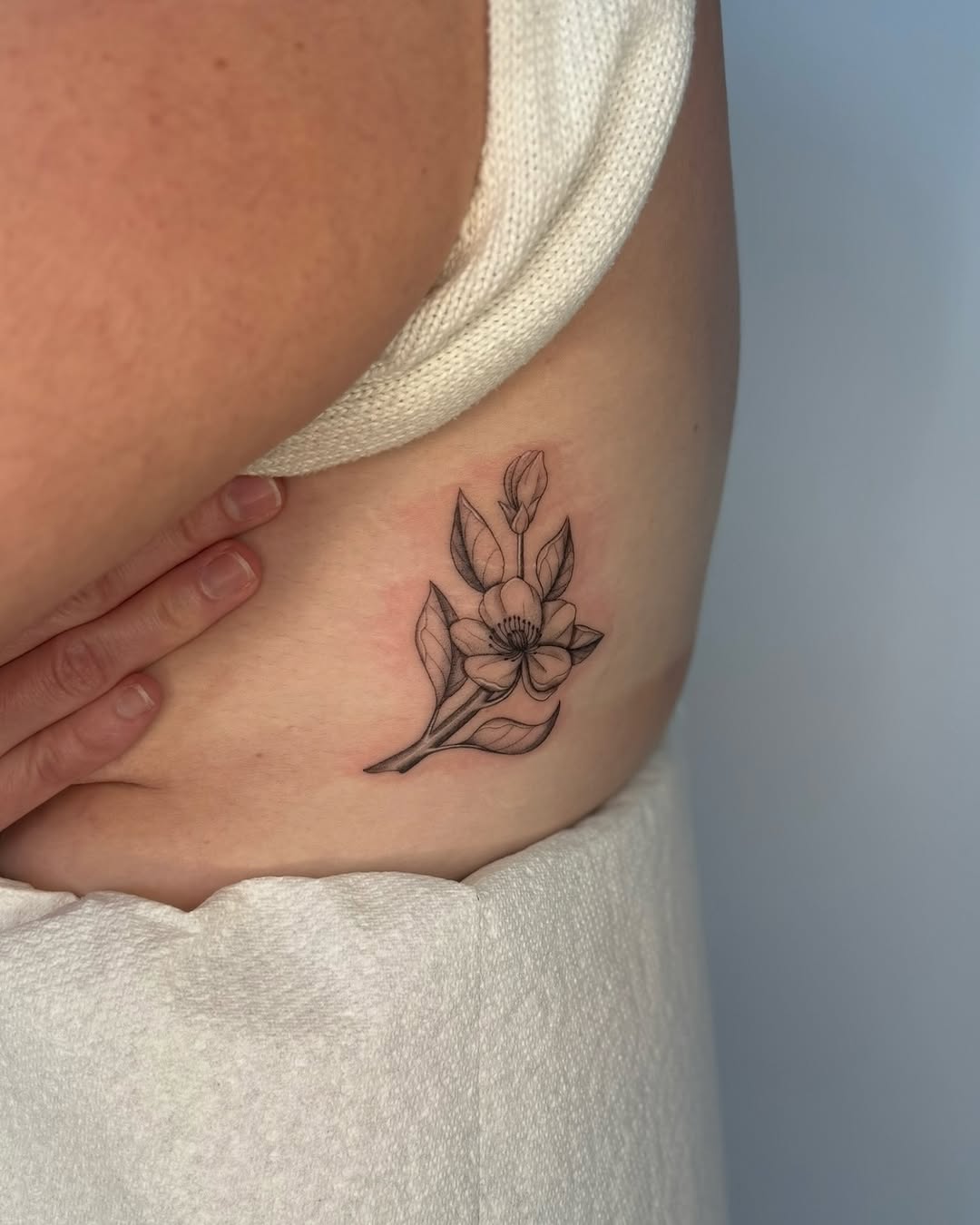 Tattoo by @jadegir.art — fine_line, black_and_grey