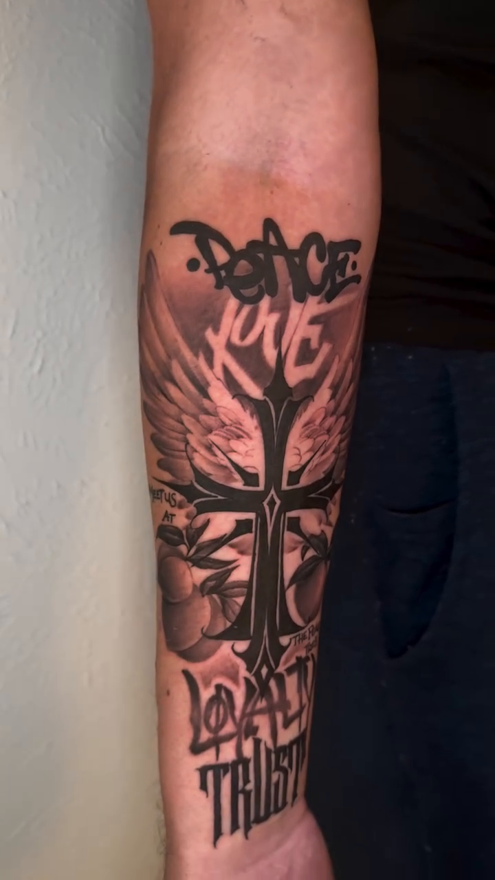 Tattoo by @mikeygraffiks — black_and_grey, lettering_script