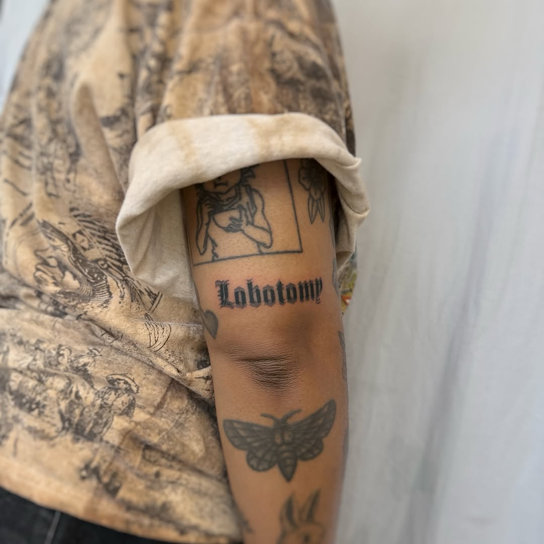 Tattoo by @mortatattoos — lettering_script, blackwork