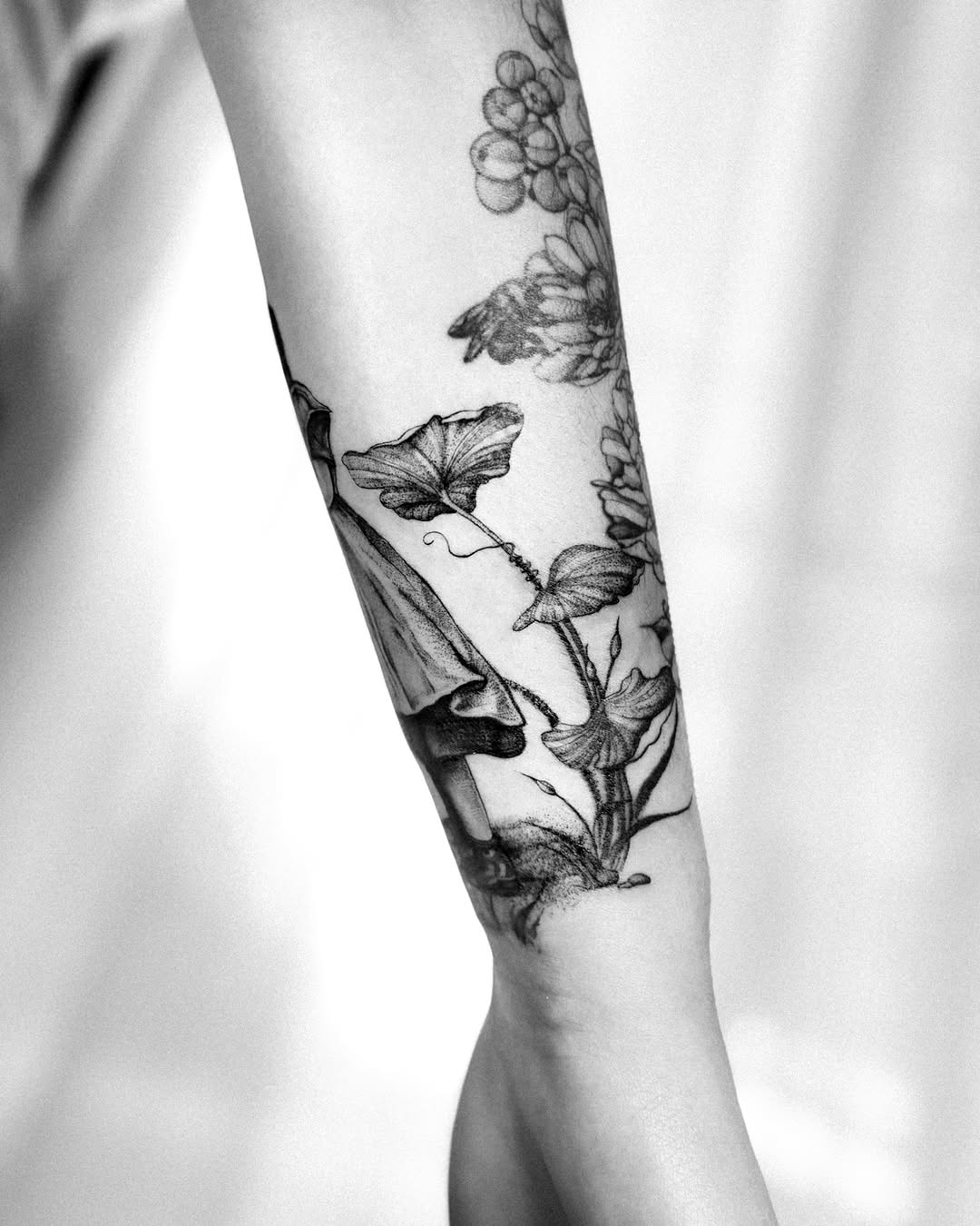 Tattoo by @yaya__ink — black_and_grey, dotwork