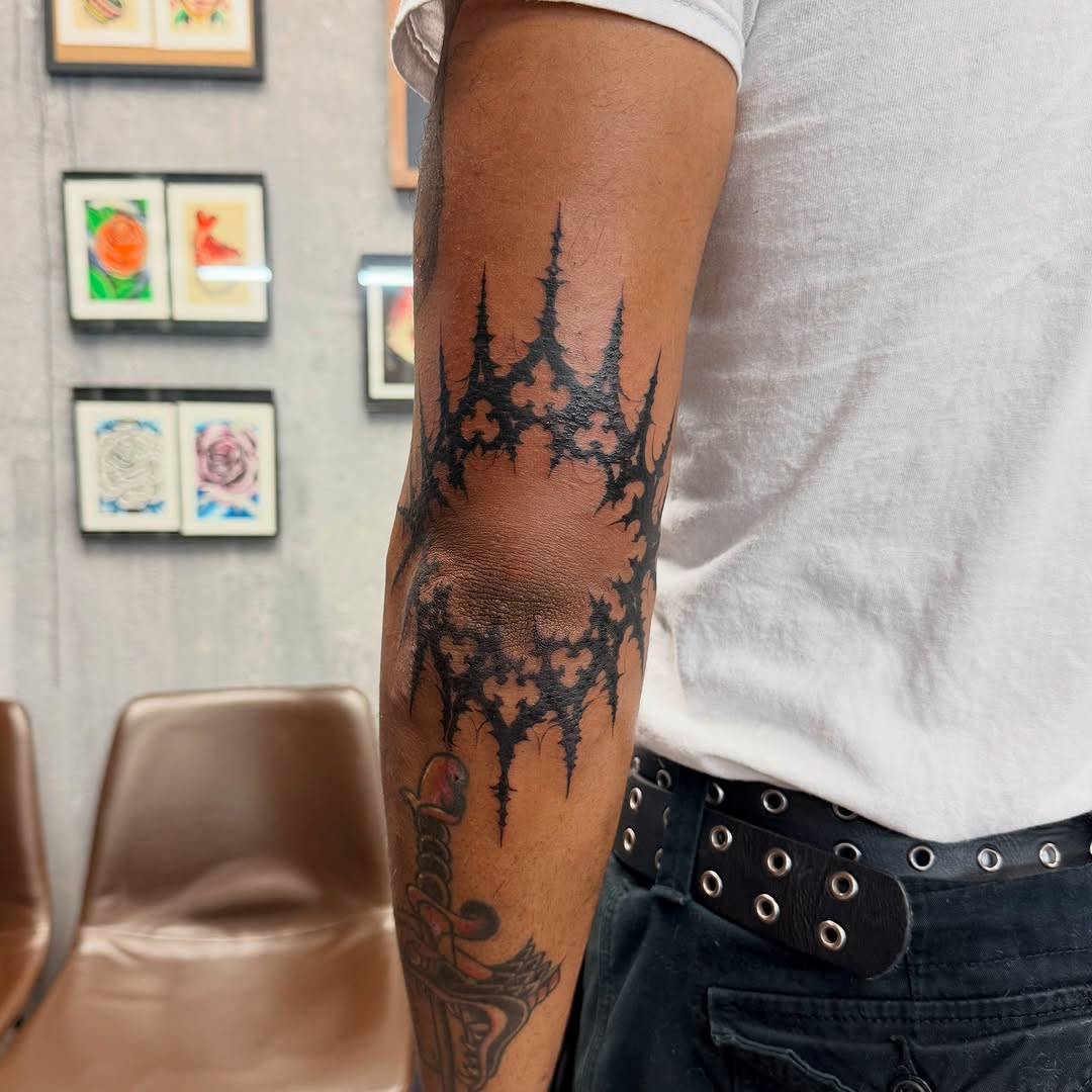 Tattoo by @chrisodtattoos — blackwork, ornamental