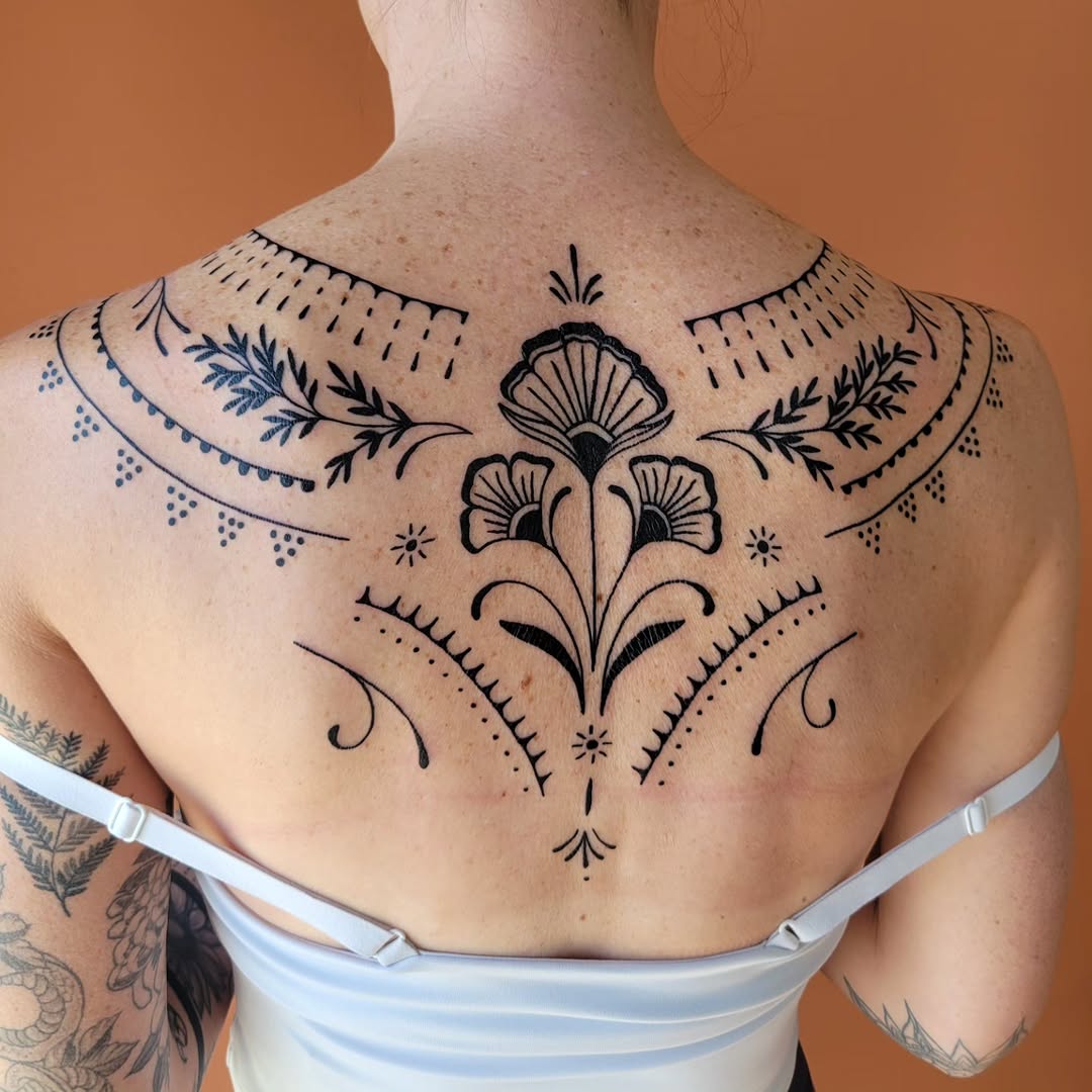 Tattoo by @aqua.suntattoos — blackwork, ornamental