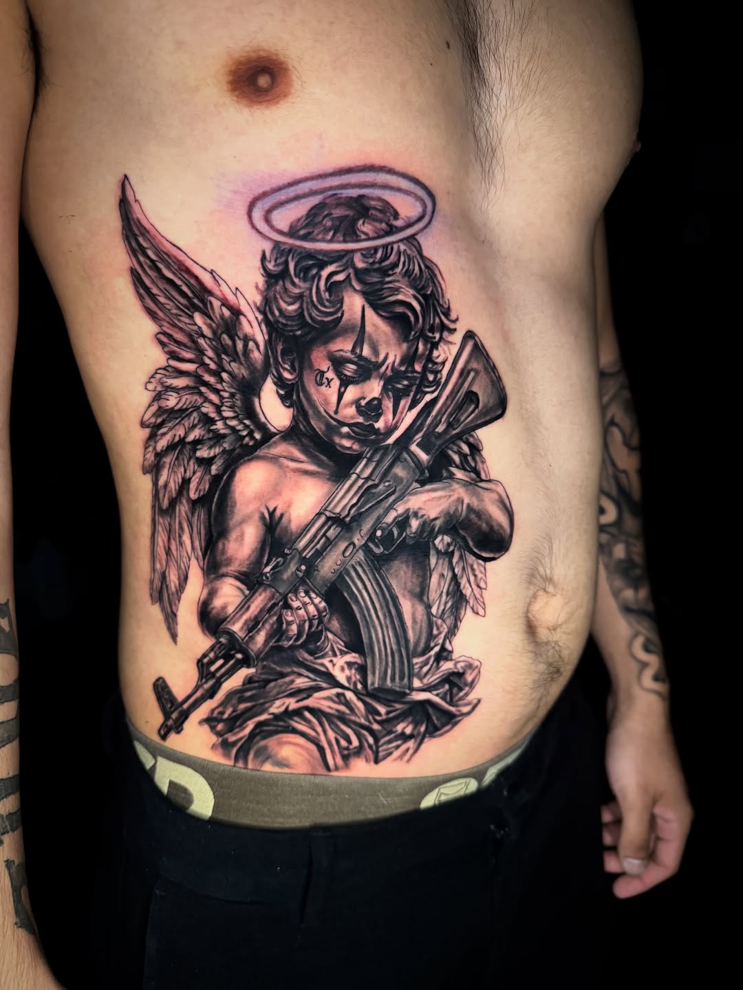 Tattoo by @tattsby0b — realism, black_and_grey
