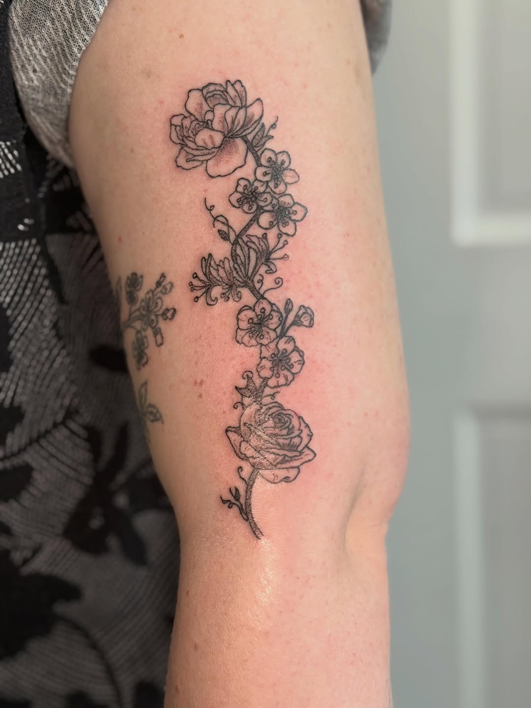 Tattoo by @ink.by.emma — fine_line, black_and_grey