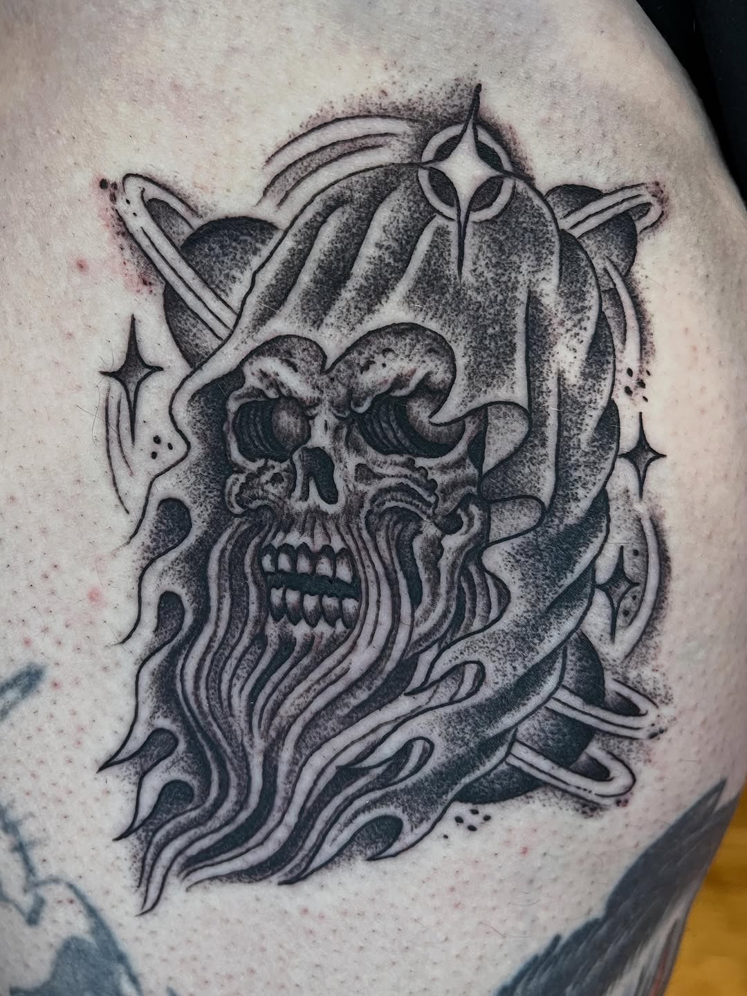 Tattoo by @graham_niles — dark_realism, black_and_grey