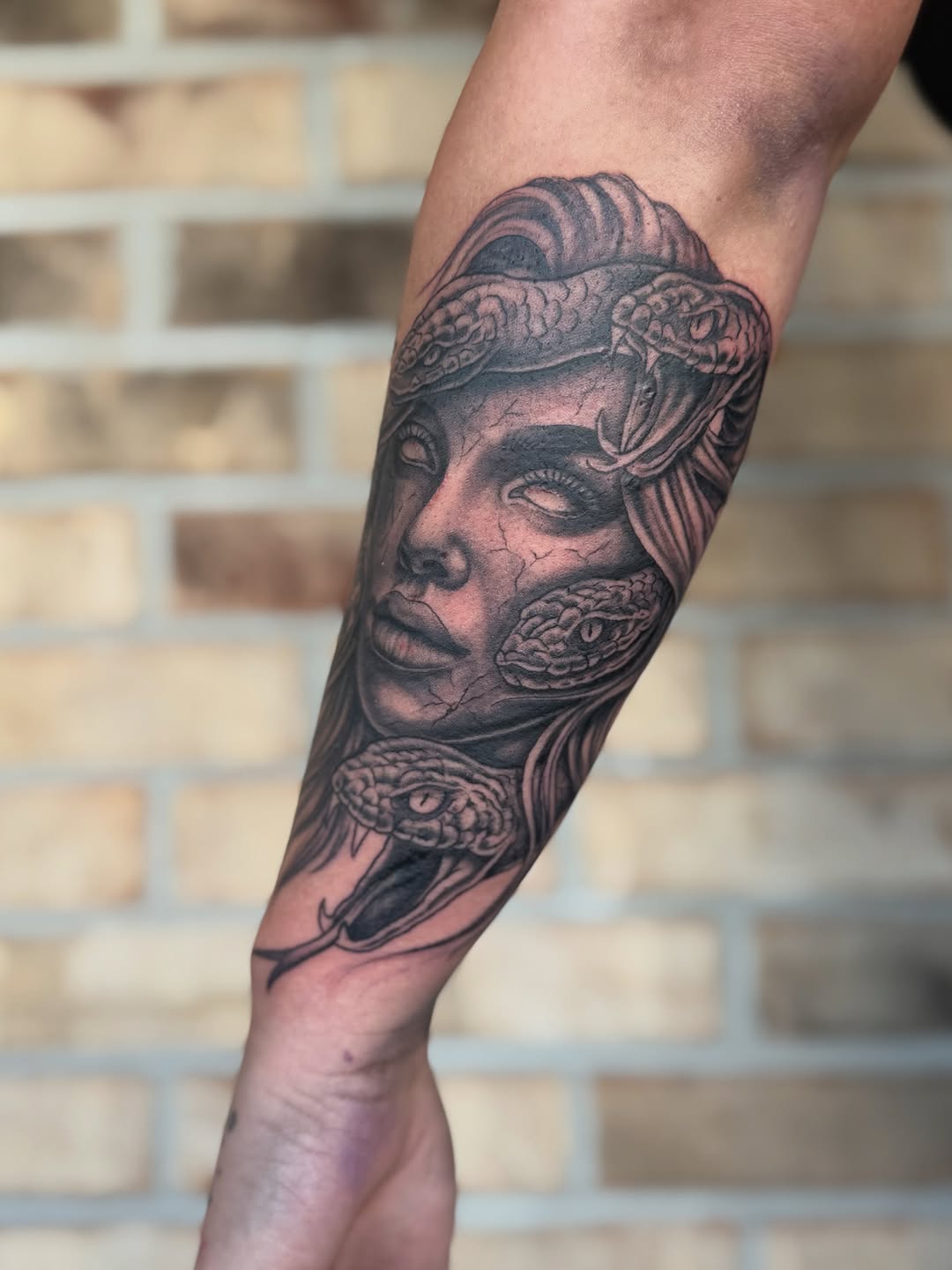 Tattoo by @stormtattoos504 — realism, black_and_grey