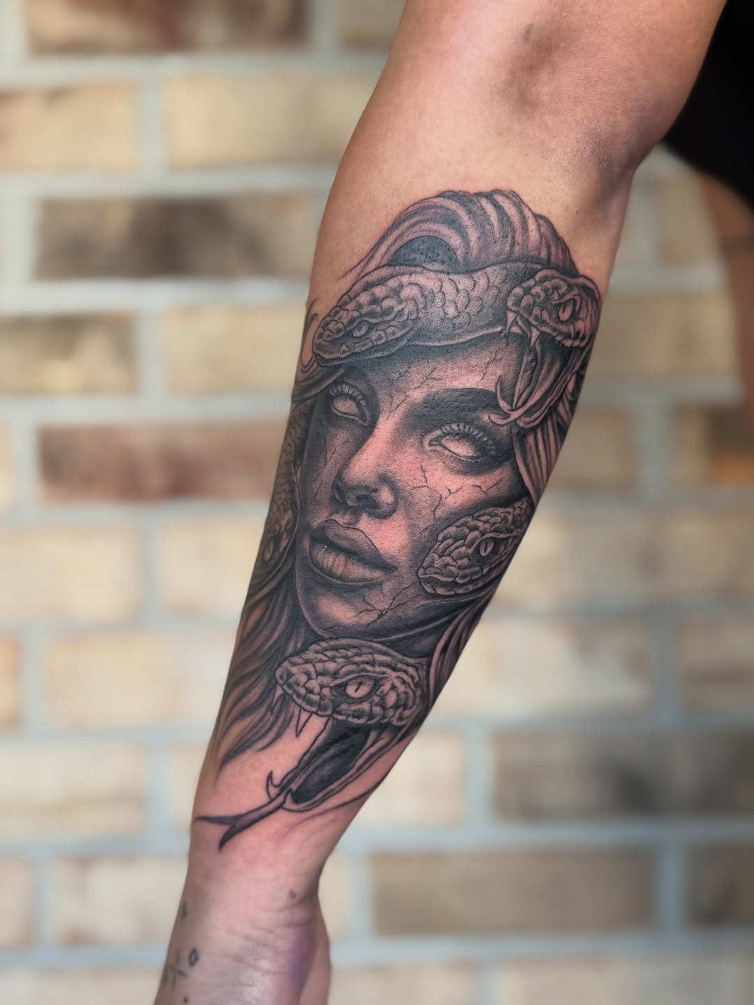 Tattoo by @stormtattoos504 — black_and_grey, realism