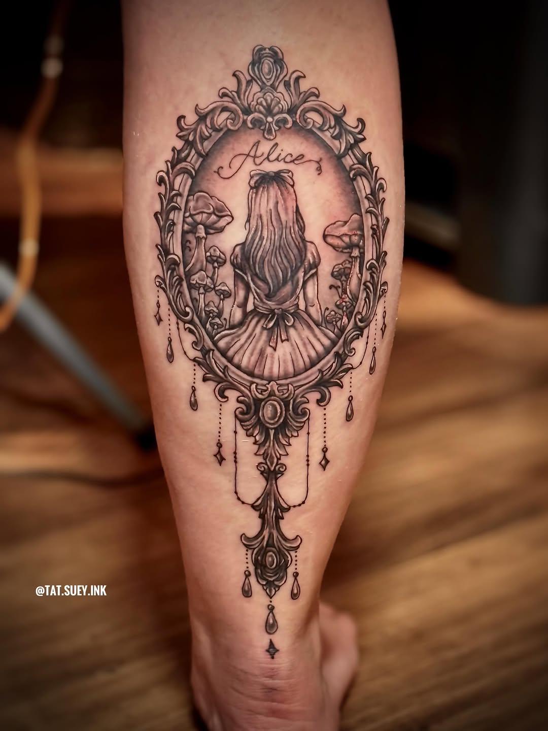 Tattoo by @tat.suey.ink — black_and_grey, realism