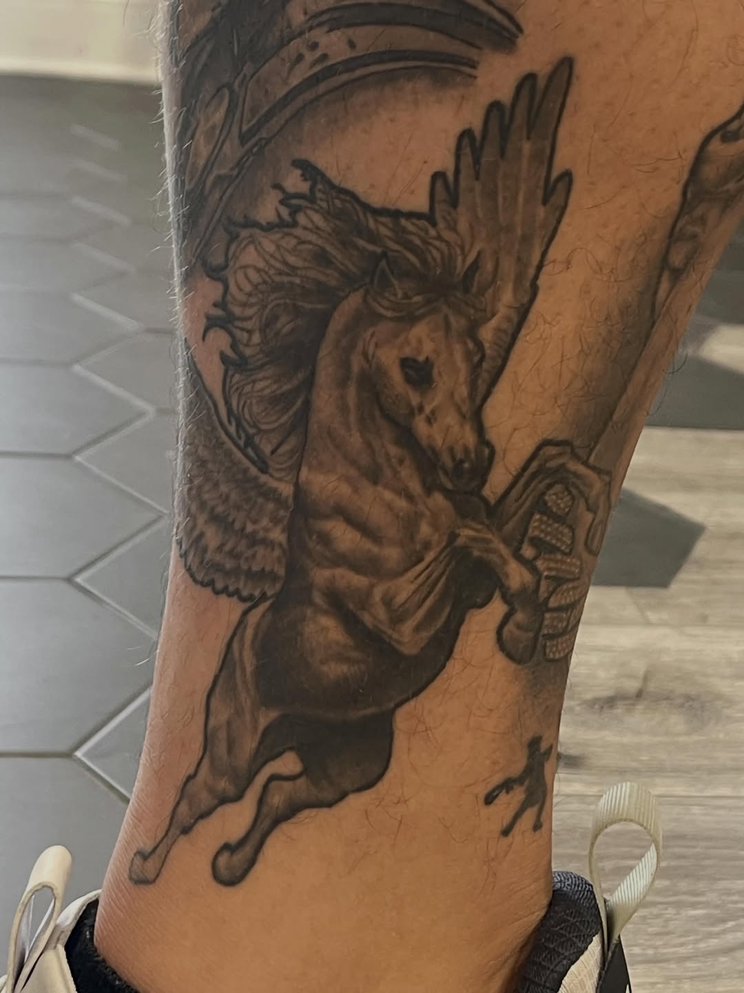 Tattoo by @bigreggtattoos — realism, black_and_grey