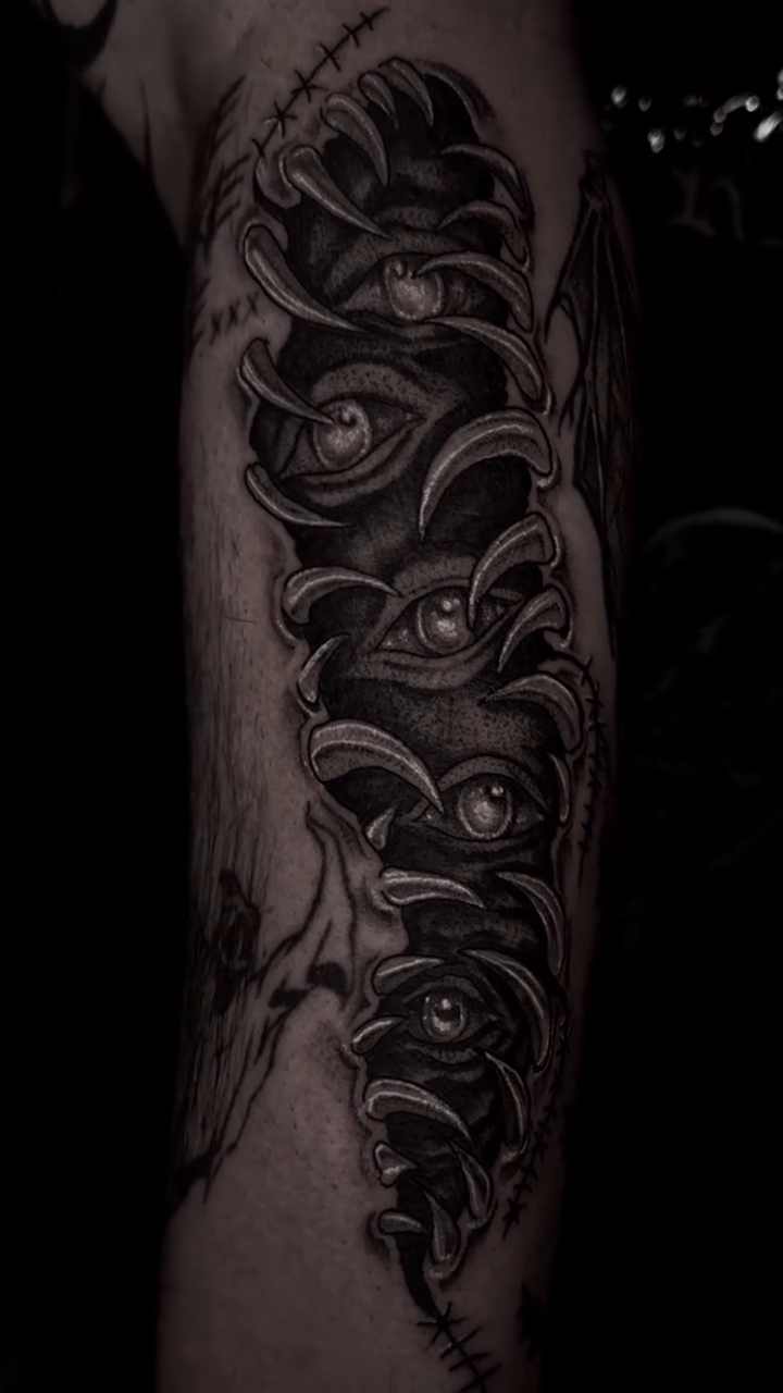 Tattoo by @kasey.tattoos — dark_realism, black_and_grey