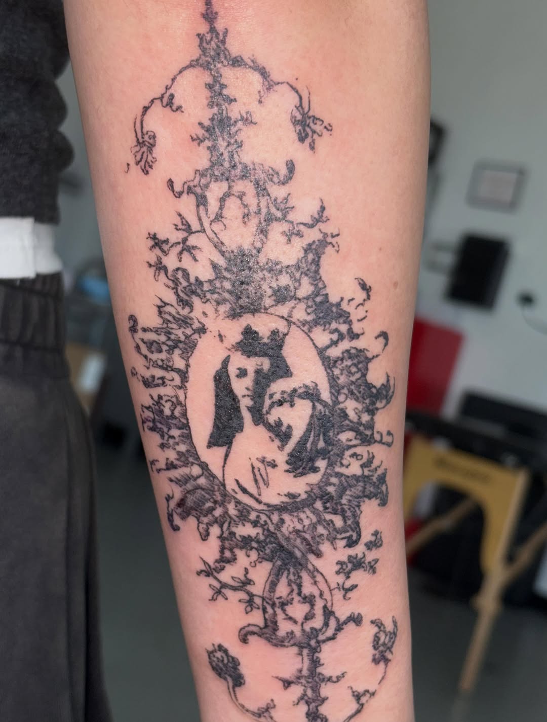Tattoo by @spikecharms — illustrative, blackwork