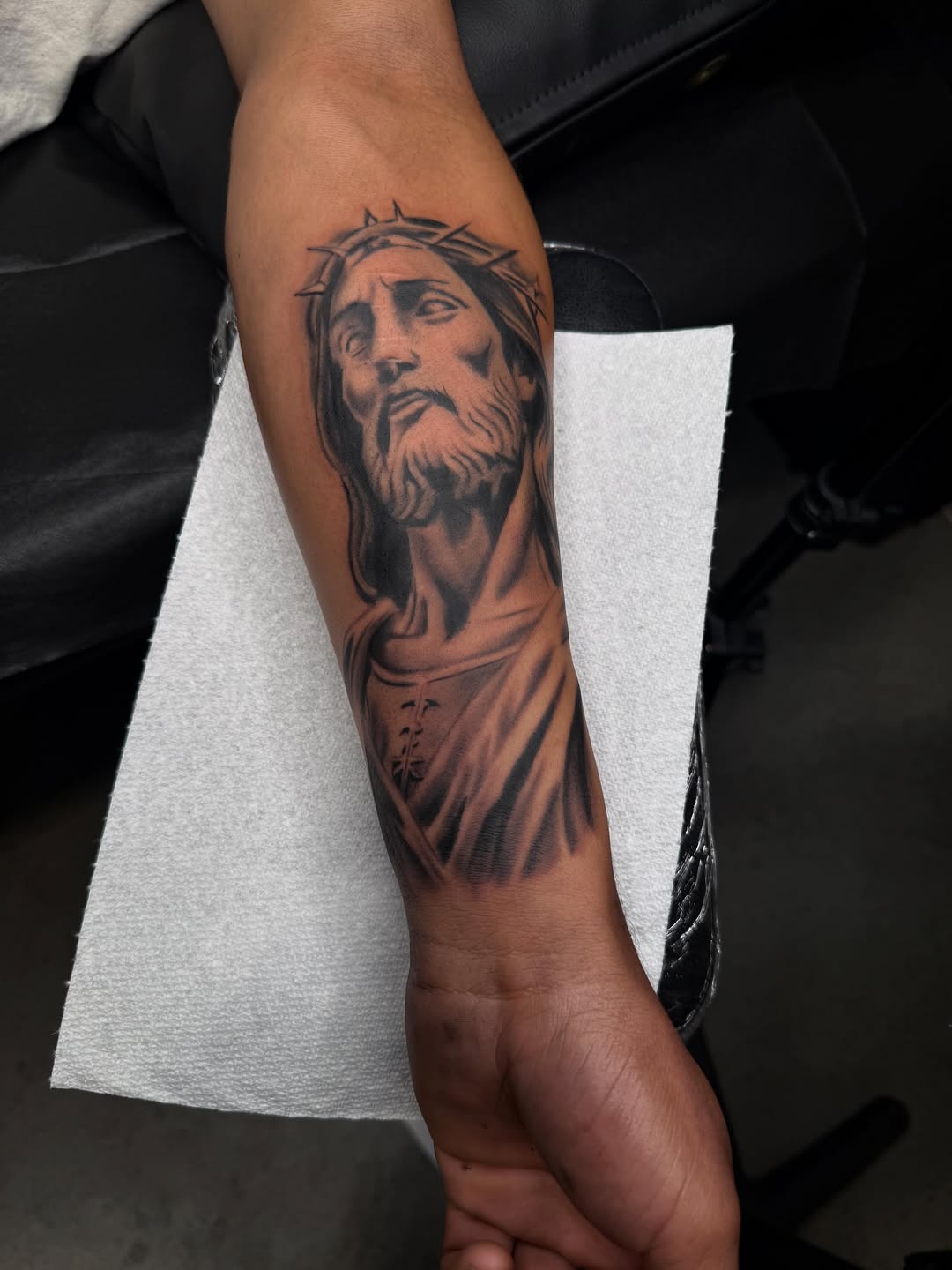 Tattoo by @unrendered_tattz — realism, black_and_grey