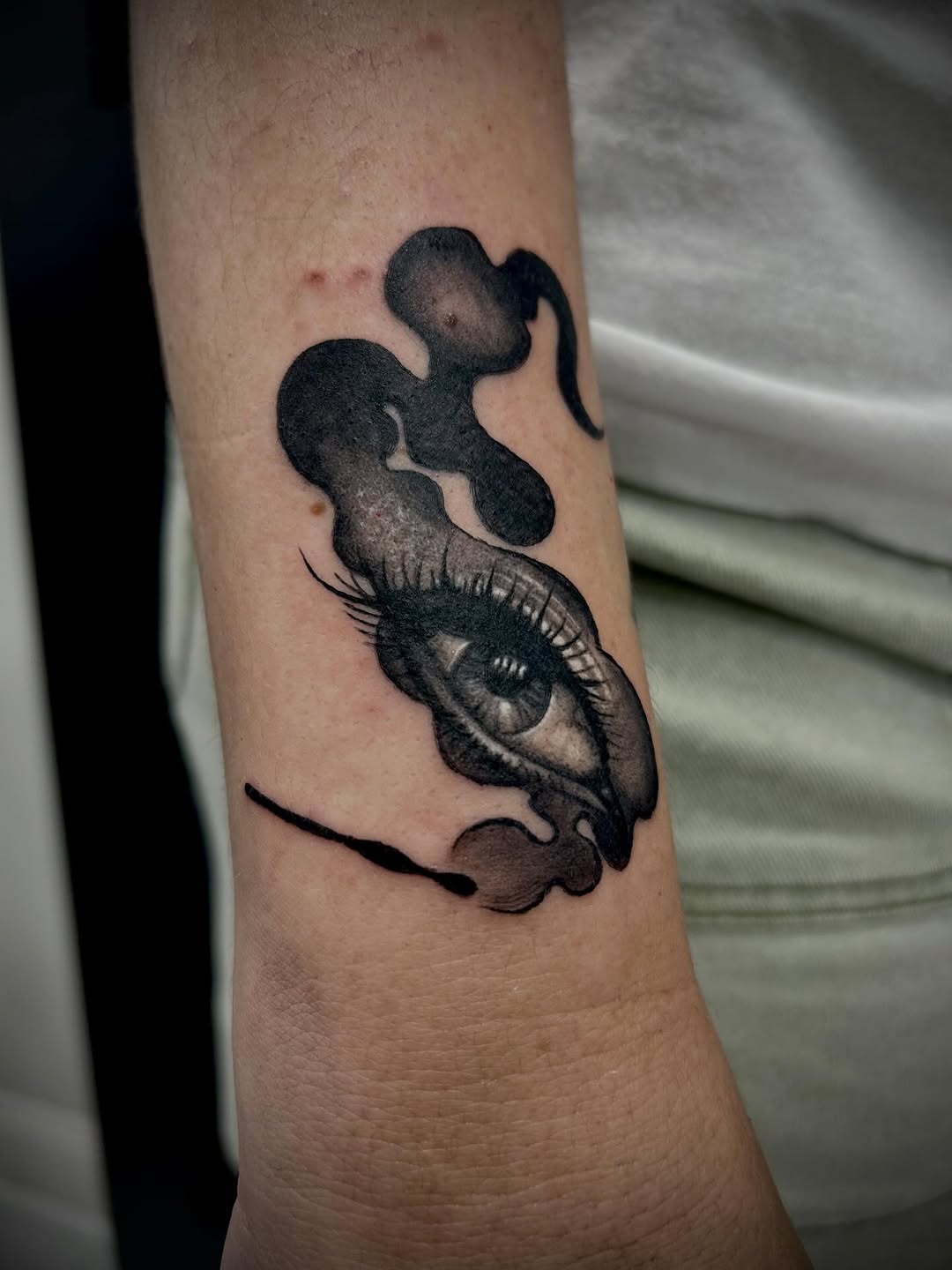 Tattoo by @antiart.inkz — black_and_grey, surrealism