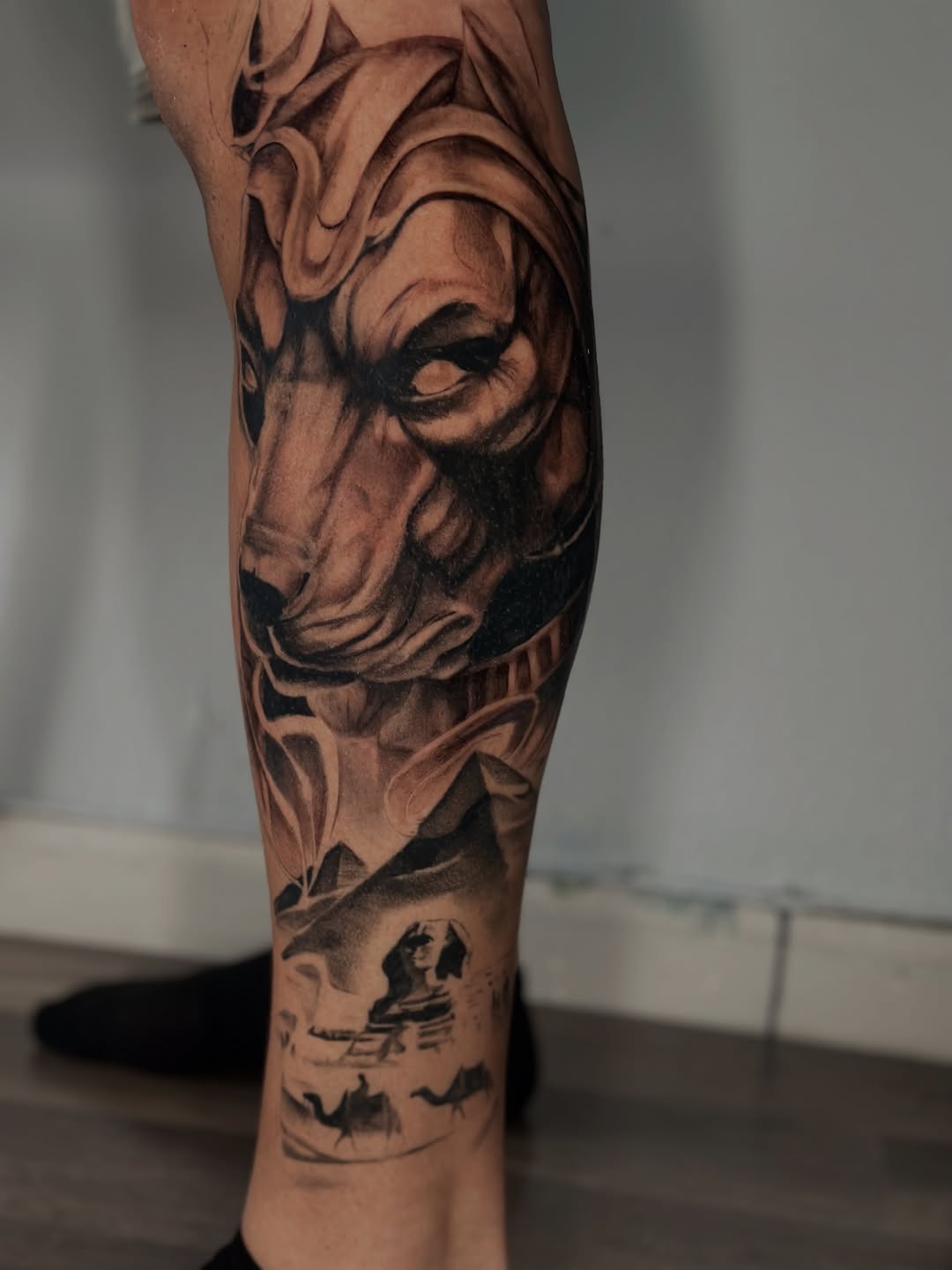 Tattoo by @tattooz_by_trent — realism, black_and_grey