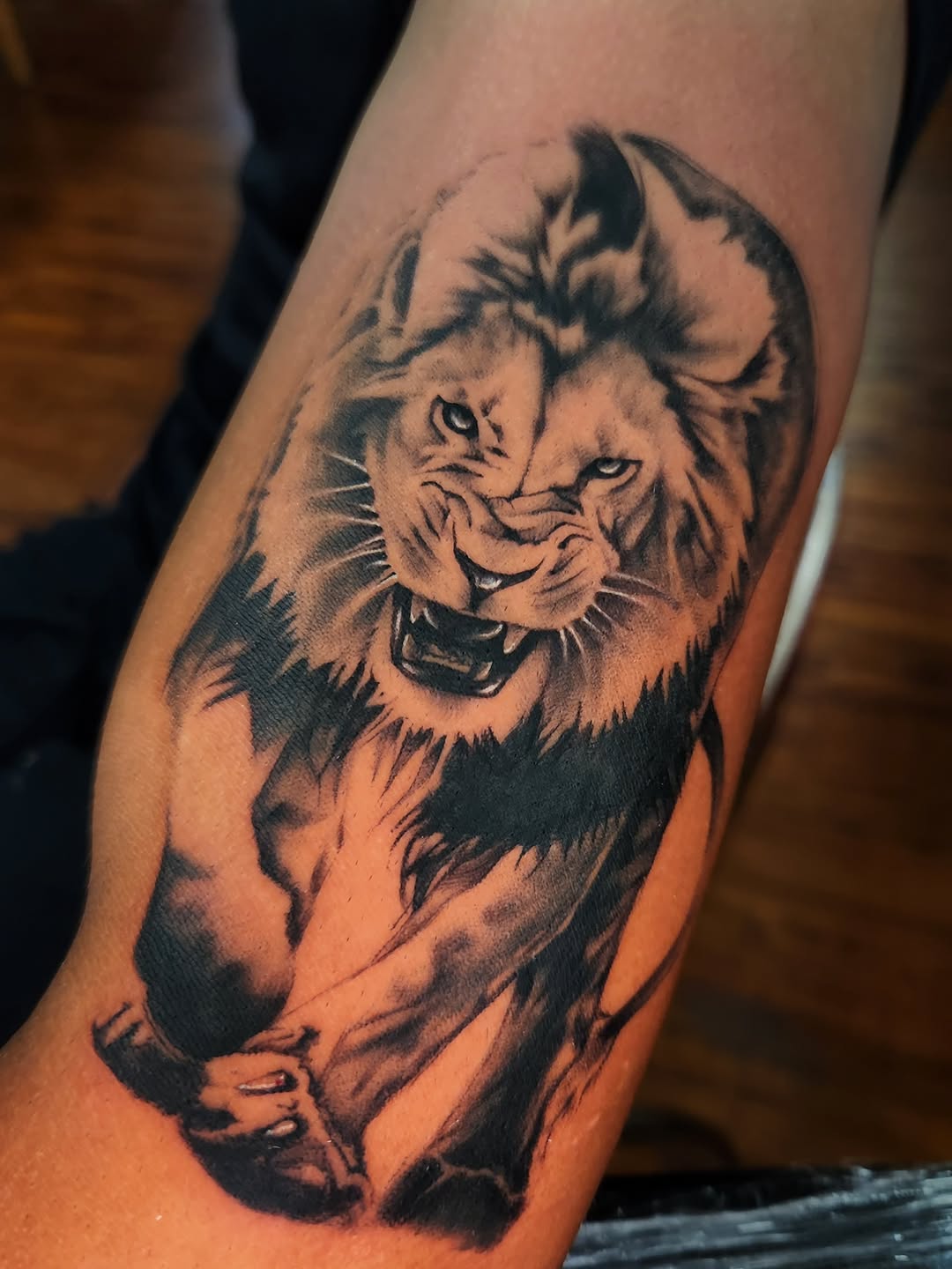Tattoo by @stone_man720 — realism, black_and_grey