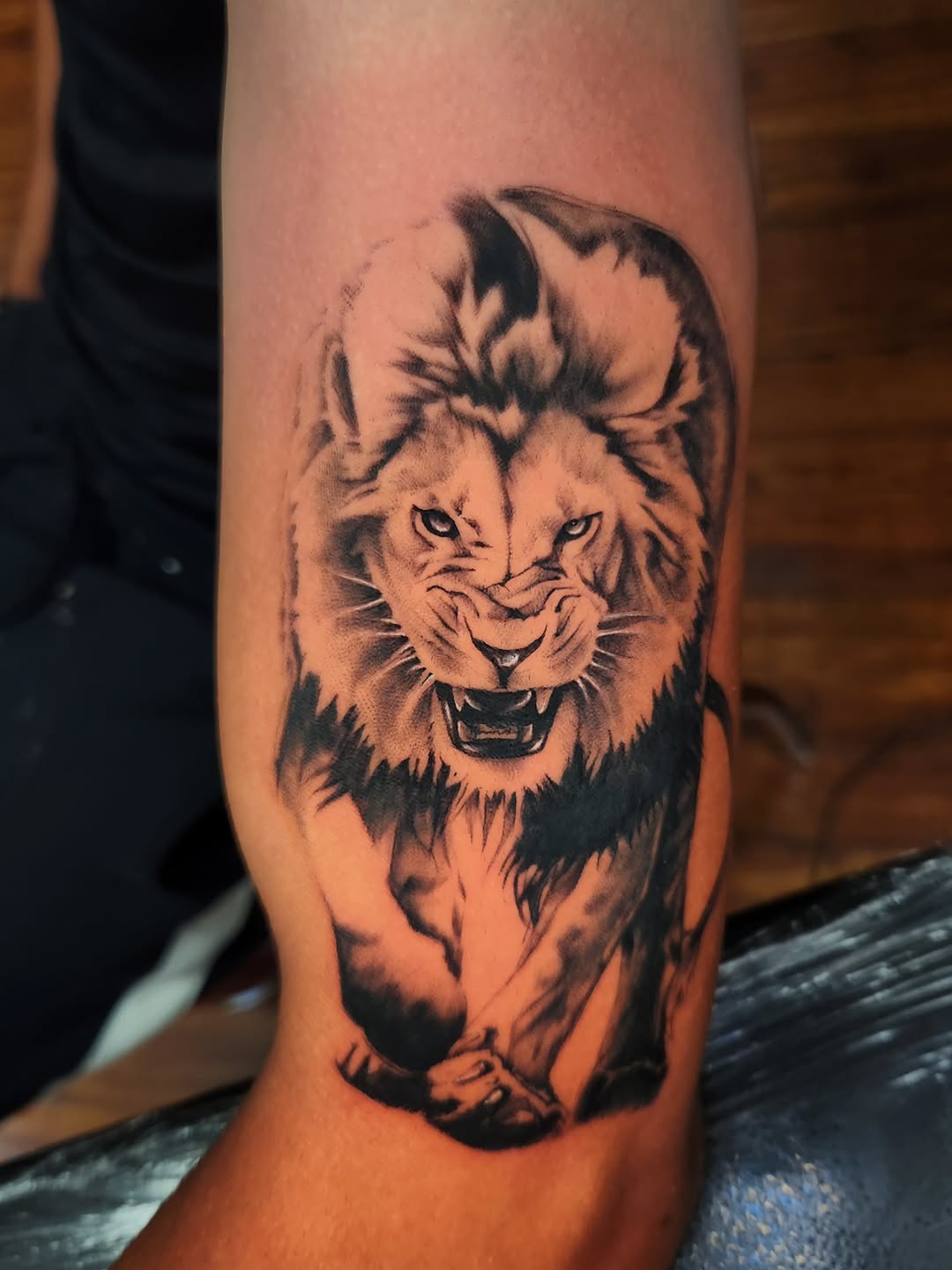 Tattoo by @stone_man720 — realism, black_and_grey