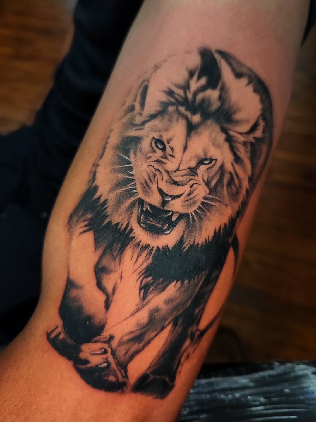 Tattoo by @stone_man720 — realism, black_and_grey