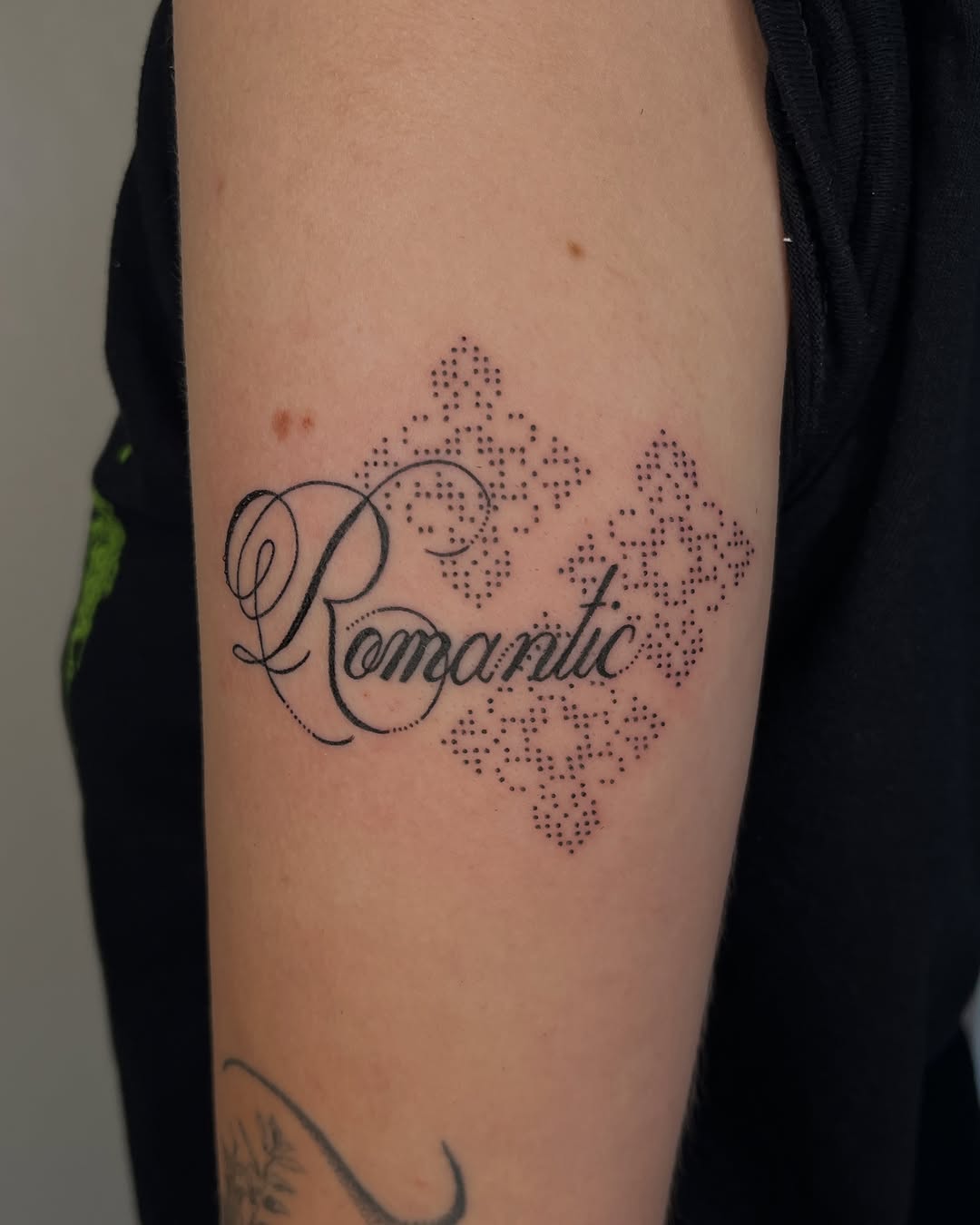 Tattoo by @toughbutton.tats — lettering_script, dotwork