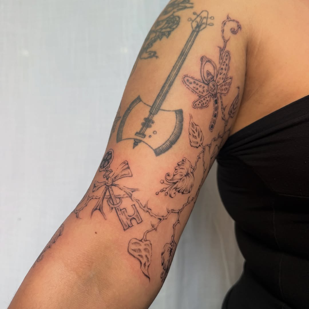 Tattoo by @fairygodfather.ink — fine_line, illustrative