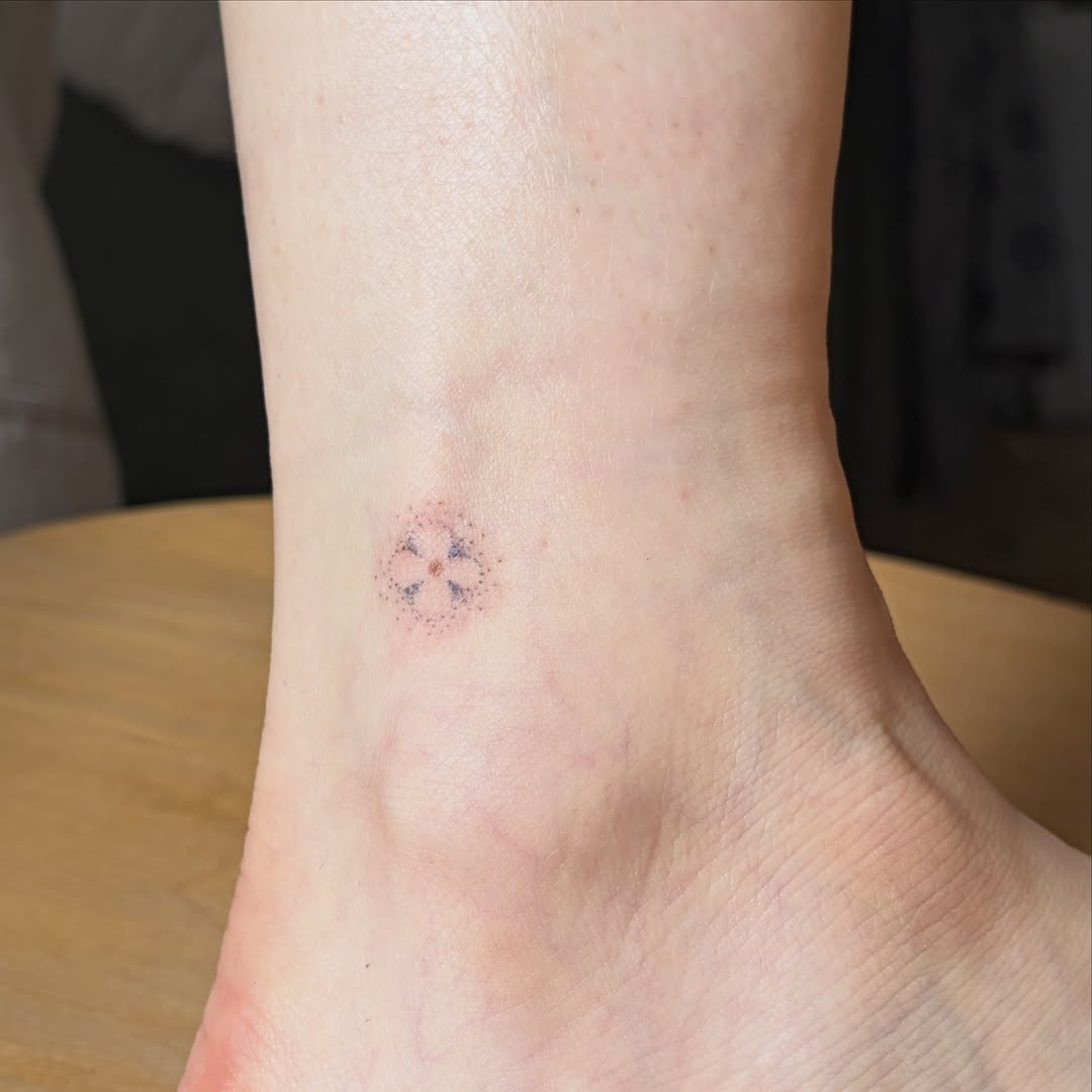 Tattoo by @drawnfromemories — fine_line, dotwork