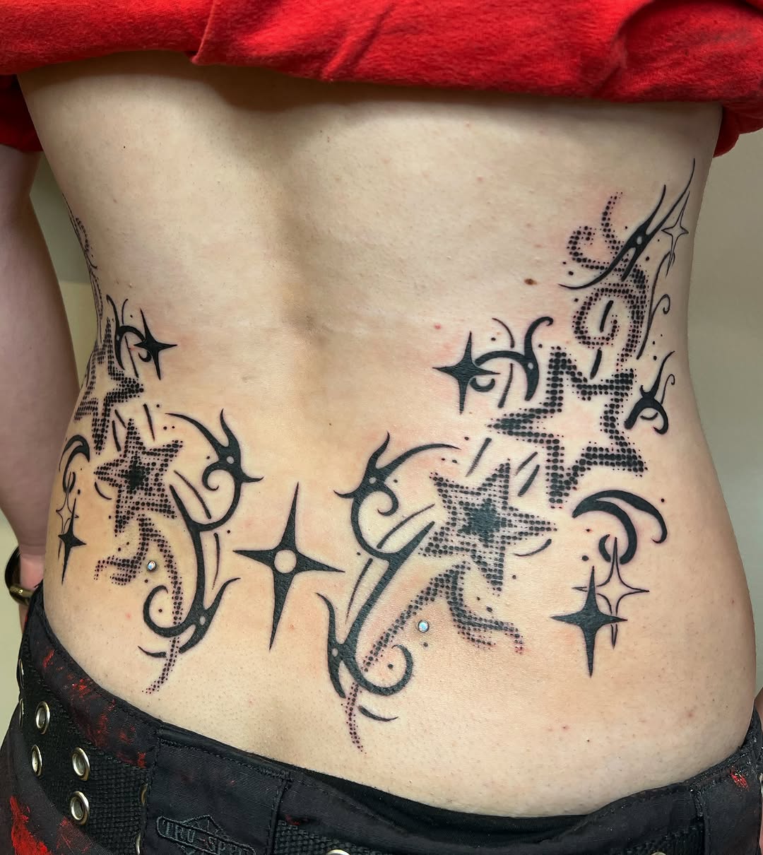 Tattoo by @toothfairytats — dotwork, tribal