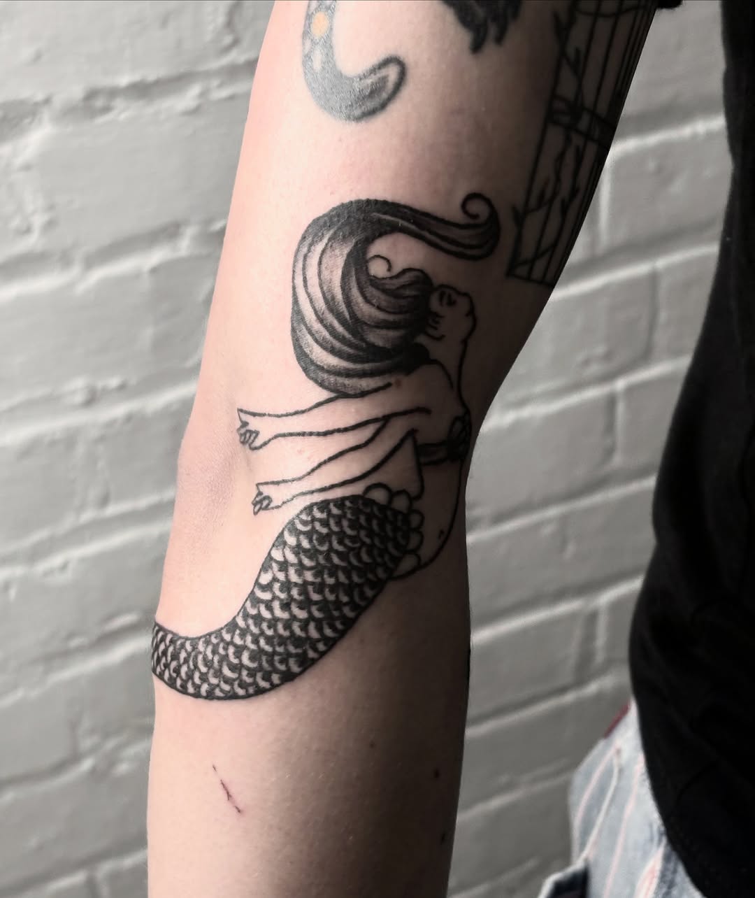 Tattoo by @mothboy_tattoo — blackwork