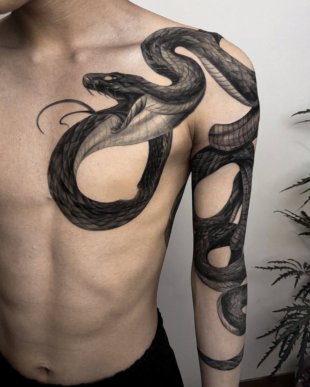 Tattoo by @swani_tattoo — realism, black_and_grey
