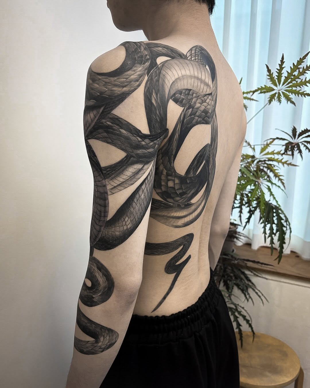 Tattoo by @swani_tattoo — realism, black_and_grey