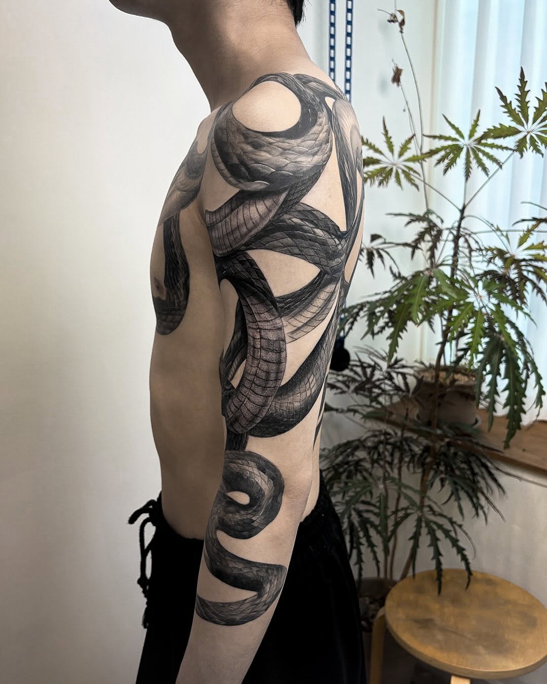 Tattoo by @swani_tattoo — realism, black_and_grey