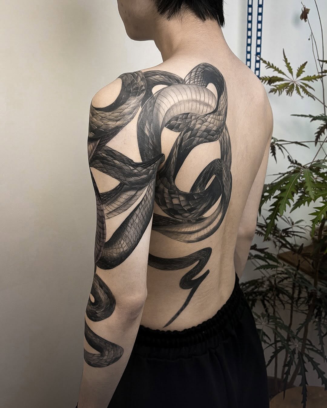 Tattoo by @swani_tattoo — realism, black_and_grey