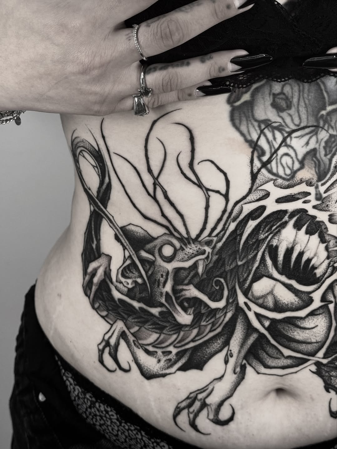 Tattoo by @bryanblack.ttt — black_and_grey, dark_realism