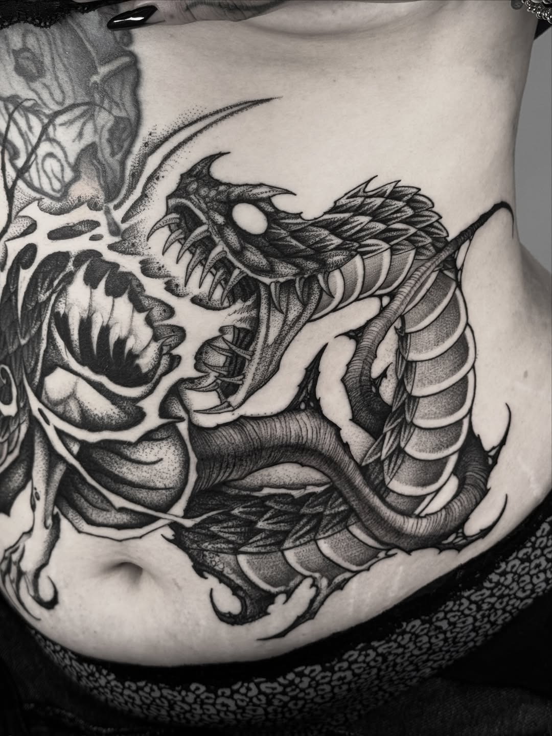 Tattoo by @bryanblack.ttt — black_and_grey, dotwork